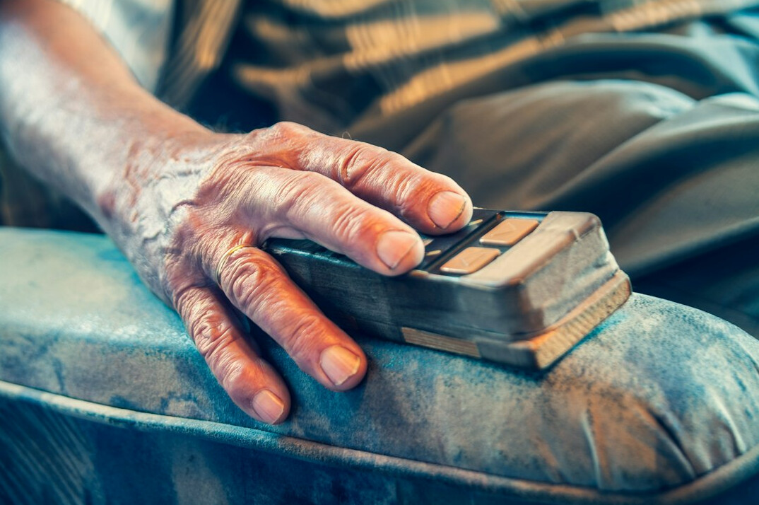 person using remote control