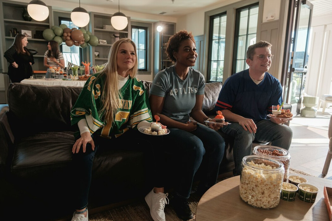 group watching tv