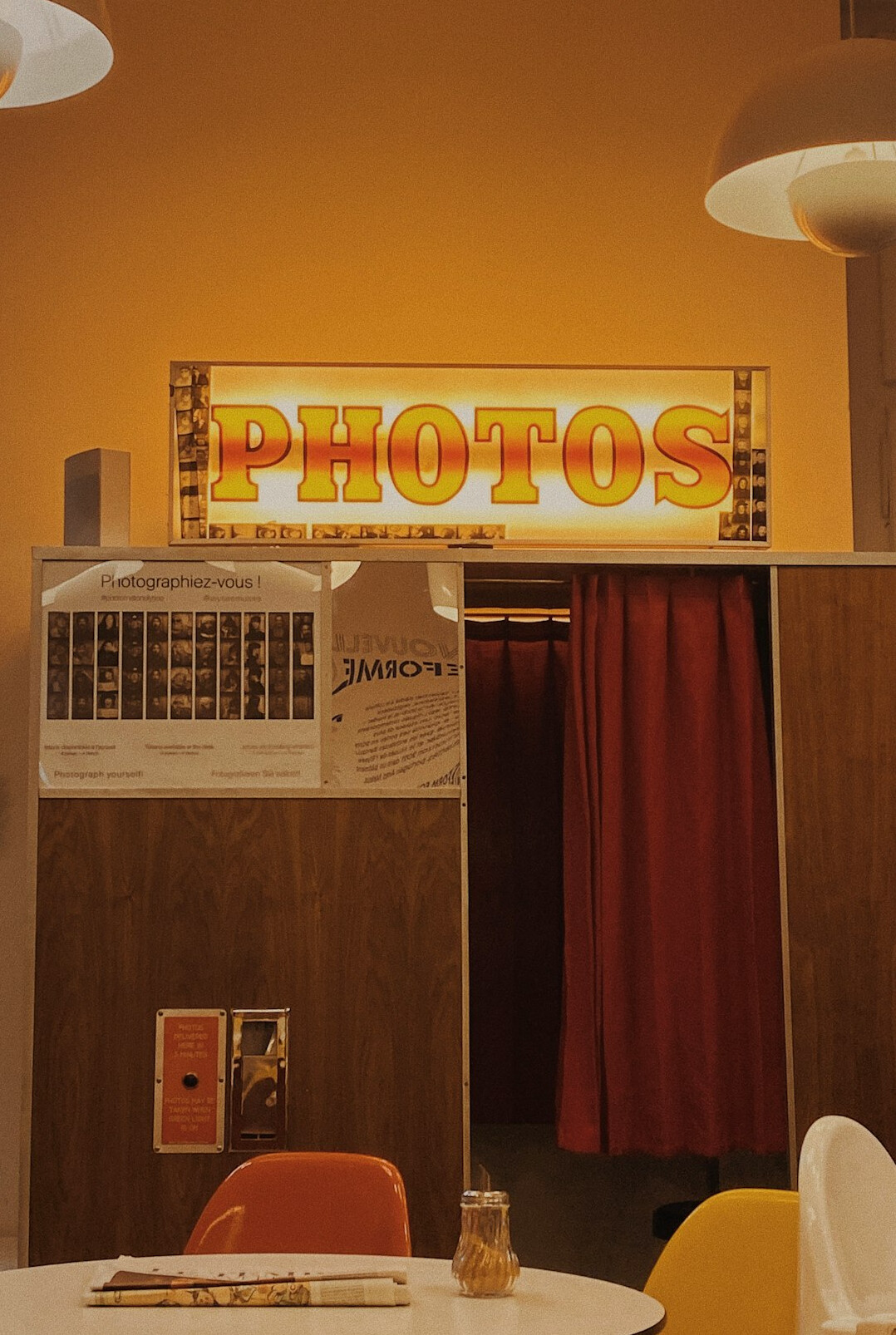 Vintage television studio with bright stage lights and cameras